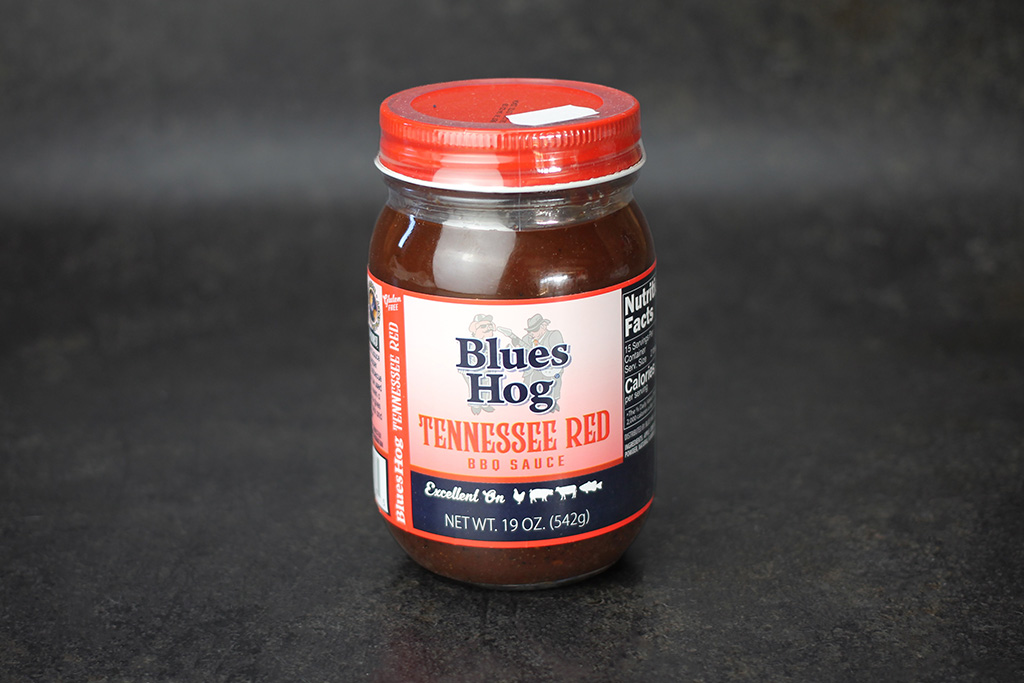 Glas mit BBQ-Sauce