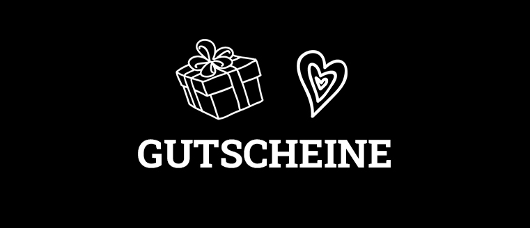 Kalieber Gutscheine eingepacktes Geschenk + Herz als Symbol für einen Geschenkgutschein