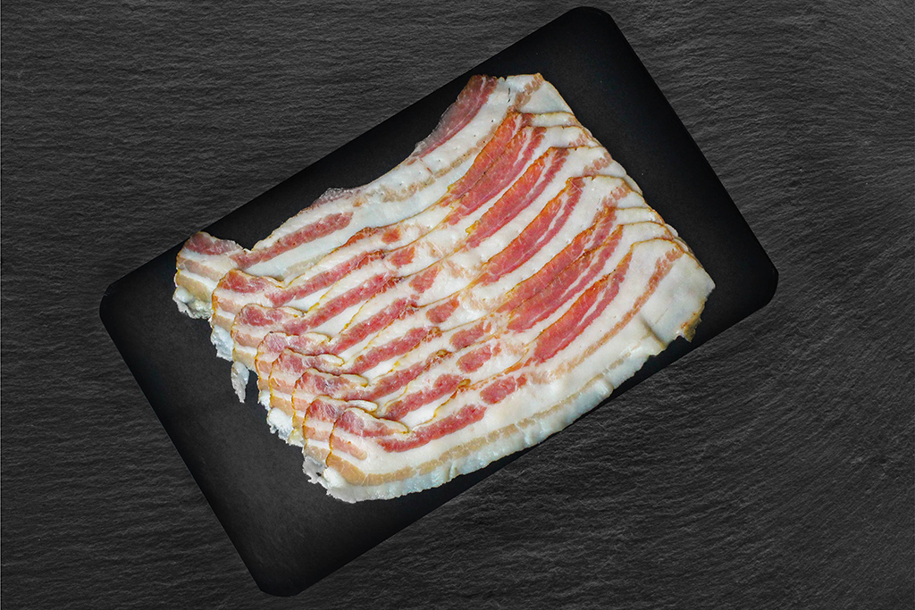 Bacon vom Bunten Bentheimer Schwein geschnitten
