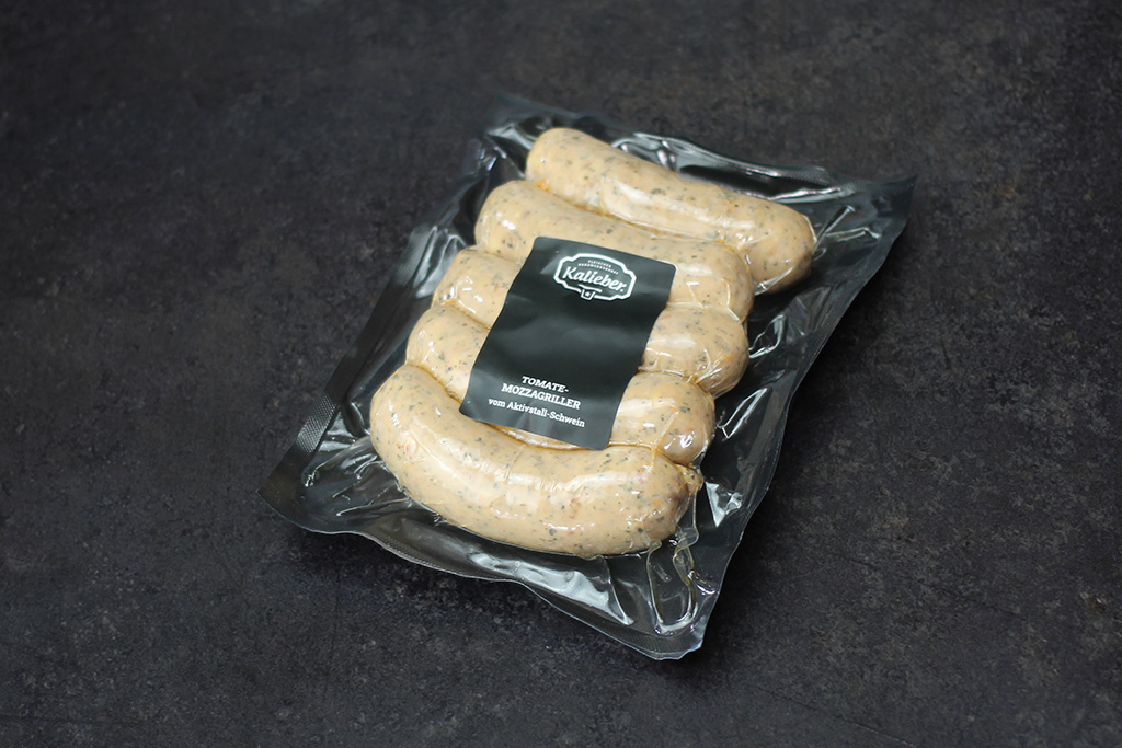 Tomate-Mozzagriller vom Aktivstall-Schwein  Packung mit fünf Bratwürsten