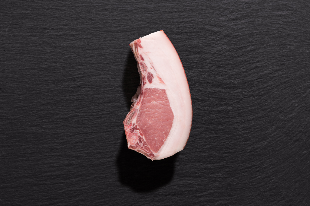Dry Aged Kotelett vom Bunten Bentheimer Schwein Dry Aged Kotelett vom Bunten Bentheimer Schwein